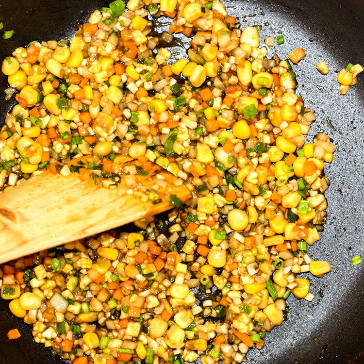 Image of Cook the fillingAdd blanched vegetables and corn kernels to the...